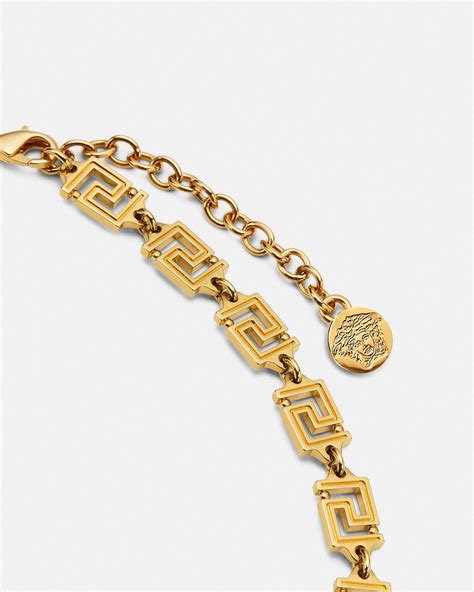 ciondolo versace uomo|Collana Medusa Greca Oro .